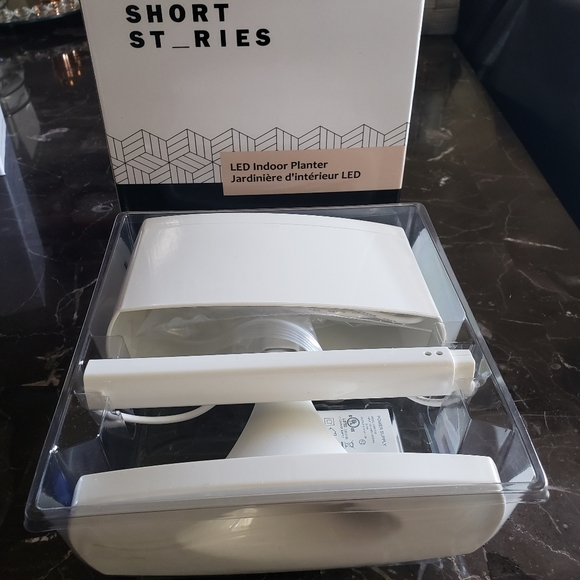 4 Fab Fit Fun Items - shower speaker,  LED planter, UV sanitizer, light diffuser - Picture 6 of 10